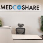 Lobby Desk and MedCoShare sign at the Pearland Office