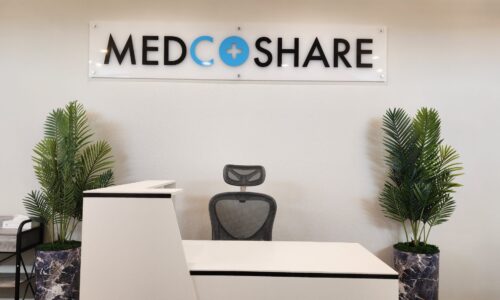 Lobby Desk and MedCoShare sign at the Pearland Office