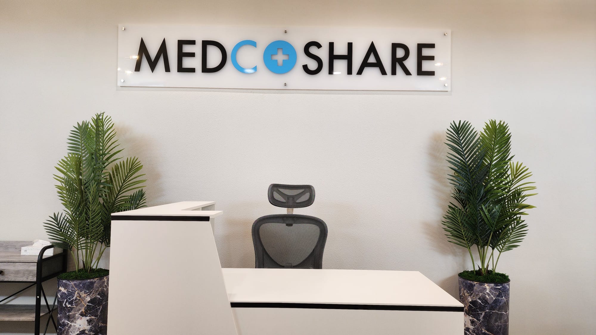 Lobby Desk and MedCoShare sign at the Pearland Office